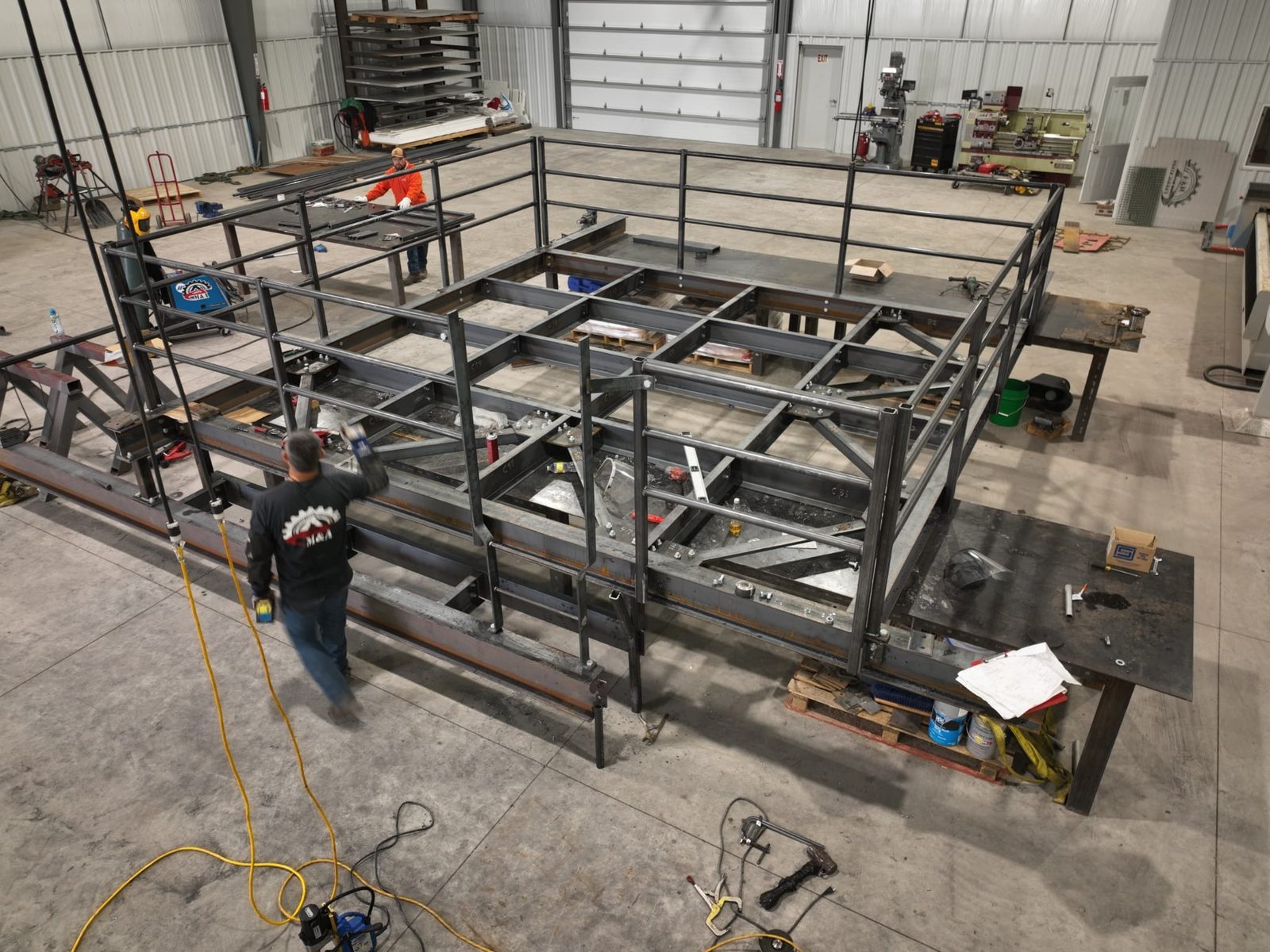 M&A crew building a steel access platform in the Atkinson, Nebraska shop